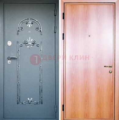Железная дверь с ковкой ламинат внутри ДК-11 в квартиру в Кингисеппе