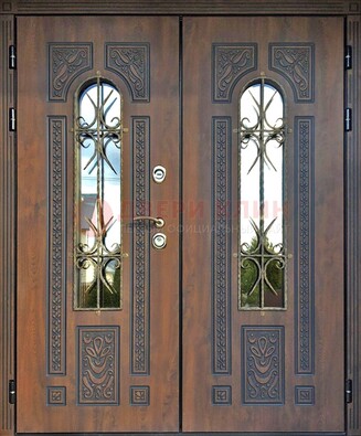 Двухстворчатая стальная дверь со стеклом и ковкой для дома ДСК-153 в Кингисеппе