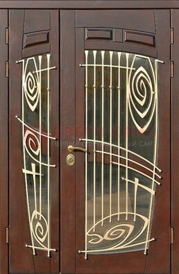 Коричневая железная дверь с большим стеклом и ковкой ДСК-203 в Челябинске