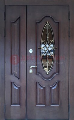 Темная металлическая дверь Винорит со стеклом и ковкой ДСК-239 в Кингисеппе