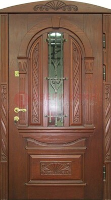 Узорная железная дверь массив со стеклом и ковкой ДСК-247 в Кингисеппе