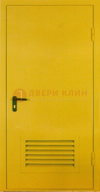 Желтая металлическая техническая дверь с вентиляционной решеткой ДТ-15 в Талдоме