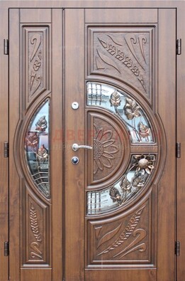 Уличная дверь в цвете Итальянский орех с виноритом и ковкой со стеклом ДВТ-147 в Кингисеппе