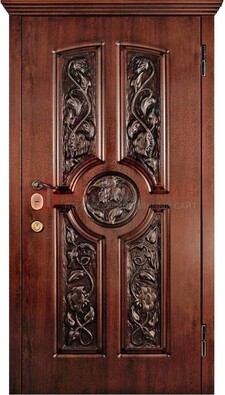 Филенчатая металлическая дверь с виноритом и резьбой ДВТ-69 в Кингисеппе