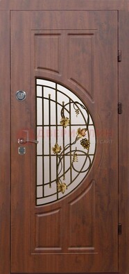 Стальная коричневая дверь с виноритом и ковкой ДВТ-82 в Кингисеппе